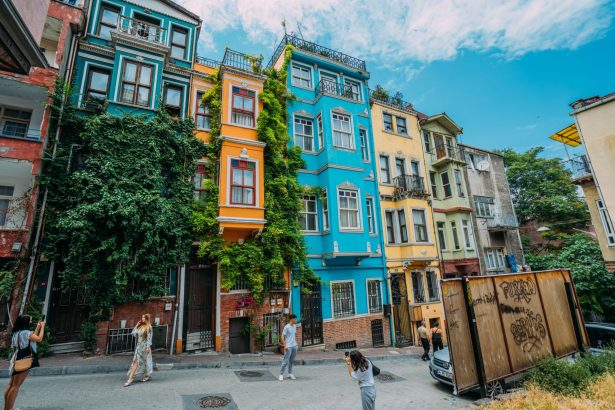 A lively street featuring colorful historic buildings, perfect for travel inspiration.